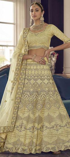 Yellow color Lehenga in Crepe Silk fabric with Thread, Zari, Zircon work