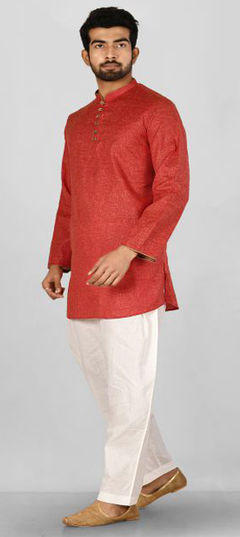 Orange color Kurta Pyjamas in Cotton fabric with Thread work