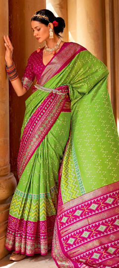 Green color Saree in Patola Silk, Silk fabric with Weaving work