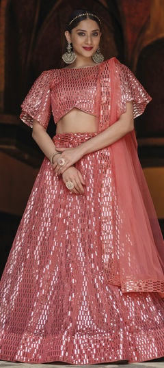 Pink and Majenta color Lehenga in Net fabric with Sequence work