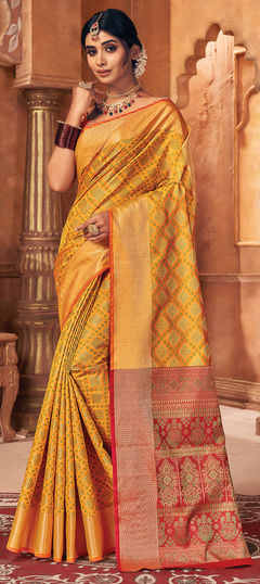 Yellow color Saree in Patola Silk, Silk fabric with Weaving work