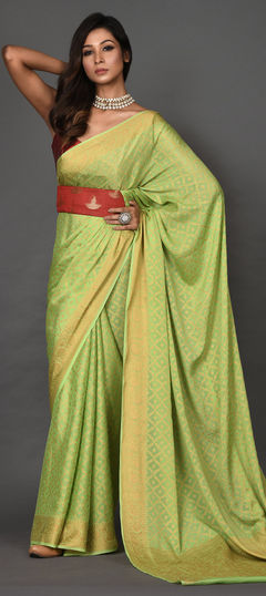 Green color Saree in Georgette fabric with Weaving work