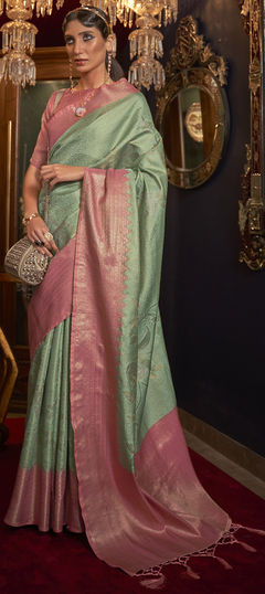 Green color Saree in Jacquard fabric with Weaving work