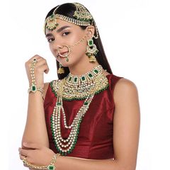 Gold Rodium Polish Green color Bridal Jewelry in Metal Alloy studded with Kundan