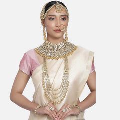 Gold Rodium Polish White and Off White color Bridal Jewelry in Metal Alloy studded with Kundan