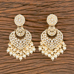 Gold Rodium Polish White and Off White color Earrings in Brass studded with Beads, Cubic Zirconia, Kundan, Pearl