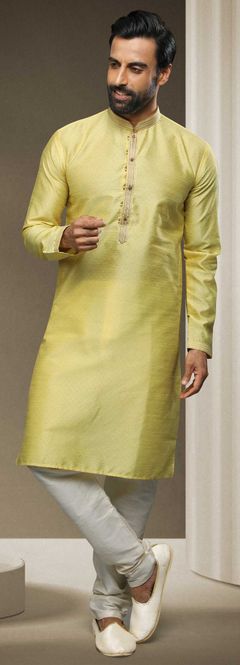 Yellow color Kurta Pyjamas in Jacquard fabric with Thread work