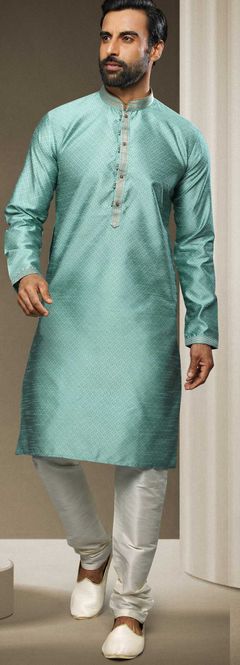 Blue color Kurta Pyjamas in Jacquard fabric with Thread work