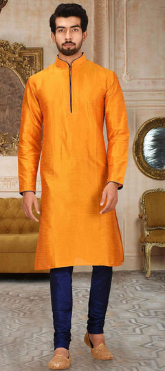 Orange color Kurta Pyjamas in Dupion Silk fabric with Thread work