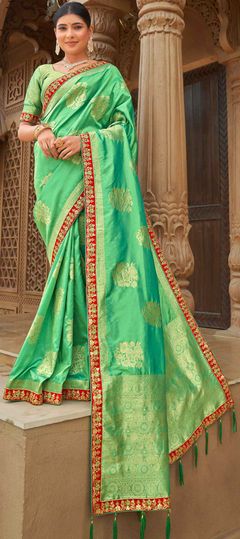 Green color Saree in Banarasi Silk, Silk fabric with Border, Embroidered, Thread, Weaving work