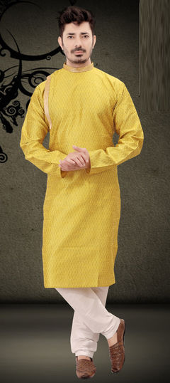Yellow color Kurta Pyjamas in Dupion Silk fabric with Lace work