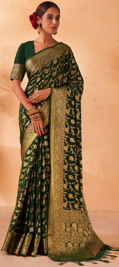 Green color Saree in Georgette fabric with Weaving work