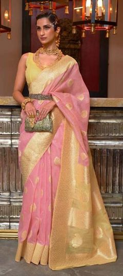 Pink and Majenta color Saree in Linen fabric with Weaving work