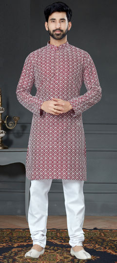 Pink and Majenta color Kurta Pyjamas in Art Silk fabric with Embroidered, Thread work