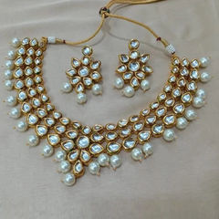 Gold Rodium Polish White and Off White color Necklace in Metal Alloy studded with Beads, Kundan