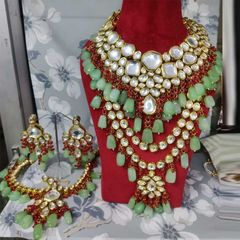 Gold Rodium Polish Green color Necklace in Metal Alloy studded with Kundan, Pearl
