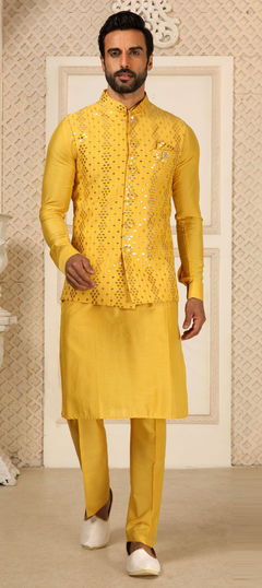 Yellow color Kurta Pyjama with Jacket in Art Silk fabric with Mirror work