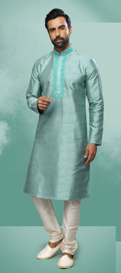 Green color Kurta Pyjamas in Art Silk fabric with Embroidered, Mirror work