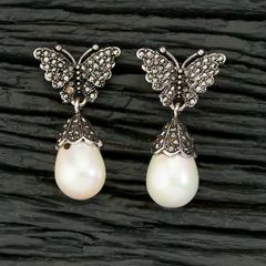 Silver Rodium Polish Blue, White and Off White color Earrings in Brass studded with American Diamond