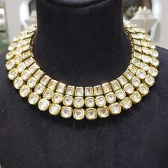 Gold Rodium Polish White and Off White color Necklace in Metal Alloy studded with Kundan