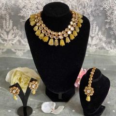 Gold Rodium Polish Yellow color Necklace in Metal Alloy studded with Kundan