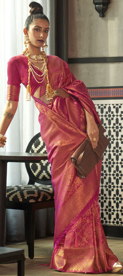 Pink and Majenta color Saree in Silk fabric with Weaving work