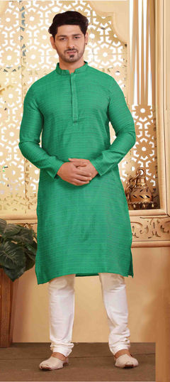 Green color Kurta Pyjamas in Jacquard fabric with Weaving work