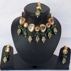 Gold Rodium Polish Green color Necklace in Metal Alloy studded with Kundan