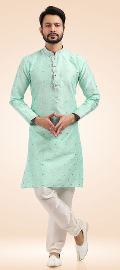 Green color Kurta Pyjamas in Jacquard fabric with Weaving work