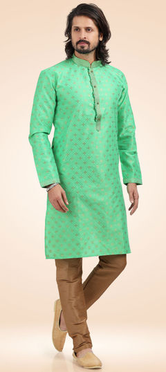 Green color Kurta Pyjamas in Jacquard fabric with Weaving work