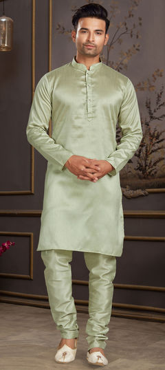 Green color Kurta Pyjamas in Art Silk fabric with Thread work