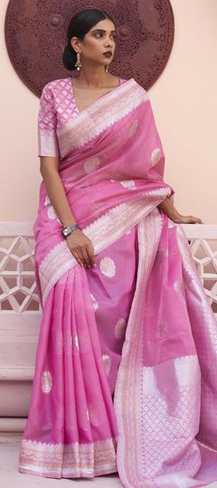 Pink and Majenta color Saree in Linen fabric with Weaving work