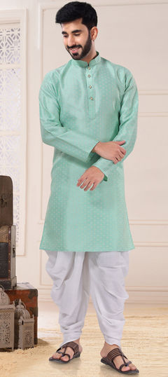 Green color Kurta Pyjamas in Jacquard fabric with Weaving work