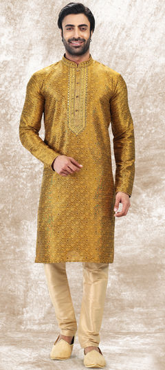 Gold color Kurta Pyjamas in Jacquard fabric with Mirror, Thread, Weaving work