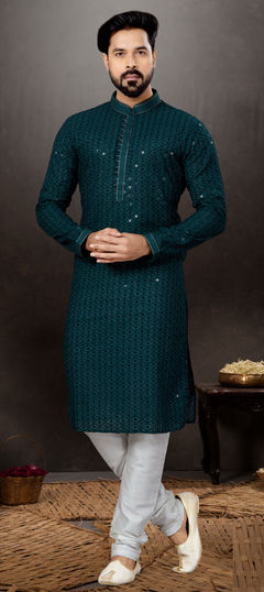 Green color Kurta Pyjamas in Rayon fabric with Embroidered, Resham, Thread work