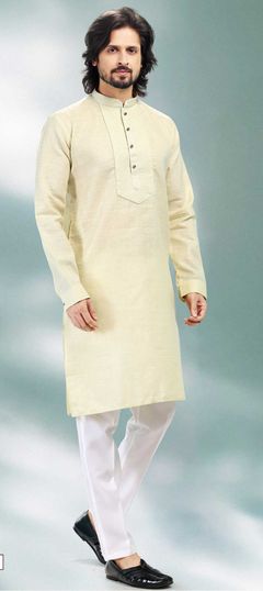 Green color Kurta Pyjamas in Cotton fabric with Thread work