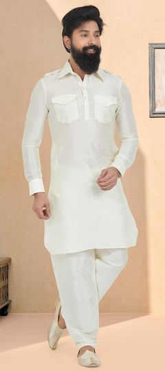 Beige and Brown color Kurta Pyjamas in Dupion Silk fabric with Weaving work