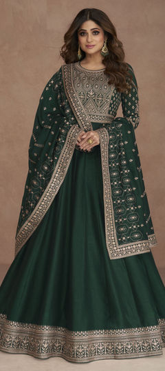 Green color Gown in Art Silk fabric with Embroidered, Sequence, Thread work