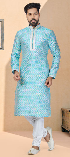 Green color Kurta Pyjamas in Jacquard fabric with Weaving work