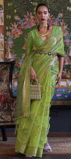 Green color Saree in Organza Silk fabric with Weaving work