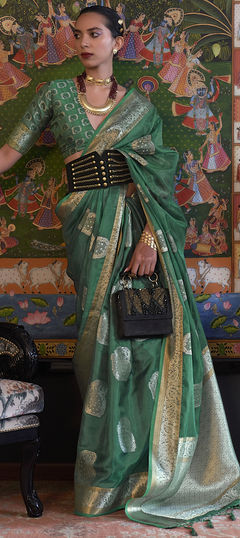 Green color Saree in Organza Silk fabric with Weaving work