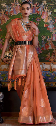 Orange color Saree in Organza Silk fabric with Weaving work