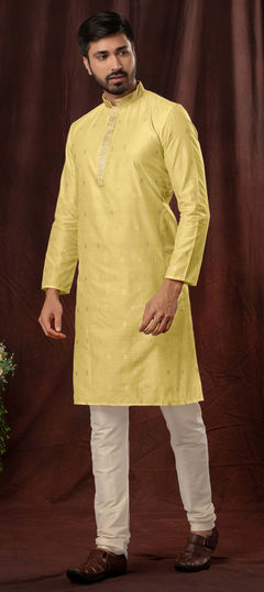 Yellow color Kurta Pyjamas in Jacquard fabric with Weaving work