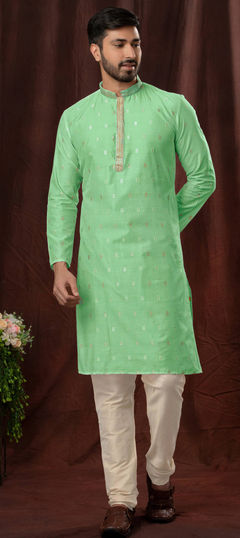 Green color Kurta Pyjamas in Jacquard fabric with Weaving work