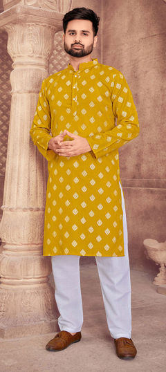 Yellow color Kurta Pyjamas in Cotton fabric with Foil Print work : 1863787