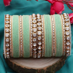 Gold Rodium Polish Green color Bangles in Metal Alloy studded with CZ Diamond