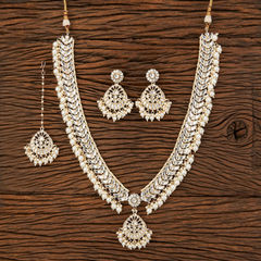 Gold Rodium Polish White and Off White color Necklace in Brass studded with Kundan, Pearl