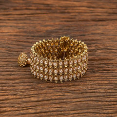 Gold Rodium Polish White and Off White color Bracelet in Brass studded with Beads