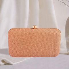 Gold color Clutches in Fancy Fabric fabric with Stone work