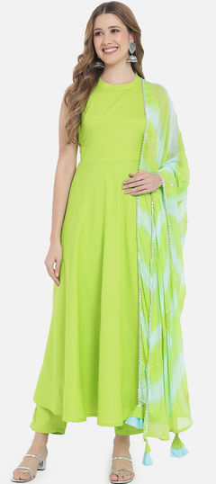 Green color Salwar Kameez in Rayon fabric with Thread work